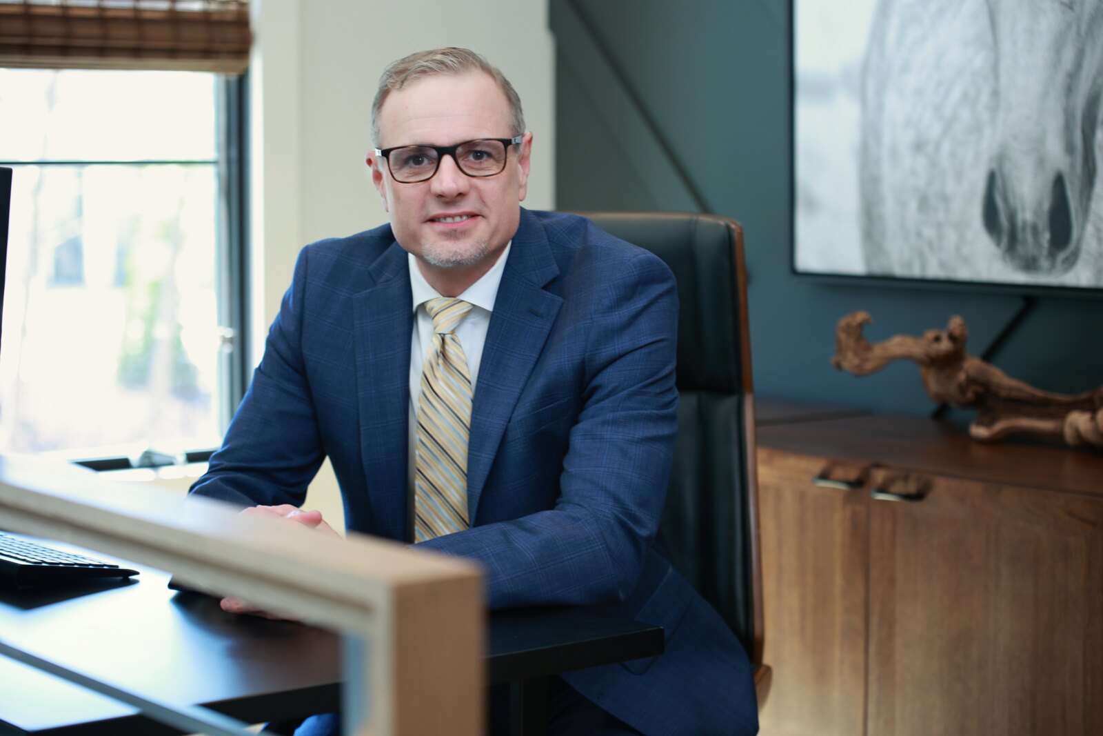 Scott Saghirian at his desk